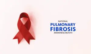 Red ribbon and text: Pulmonary Fibrosis Awareness Month, inspired by the organization Phoebe, on a light pink background.